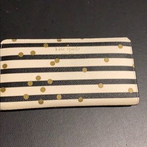 kate spade black and white striped wallet with gold polka dots